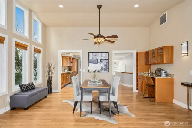 Notice the plumbed wet bar in the dining area with space for a wine or beverage fridge.