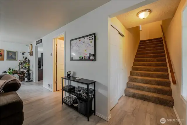 View from front door to Stairwell, Full Bathroom and Doorway to the Recreation Room