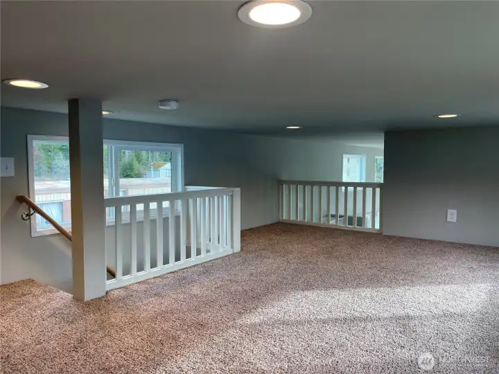 Love this up stairs area! I've seen a King bed and entertainment center up here! Love this up stairs area! I've seen a King bed and entertainment center up here!
