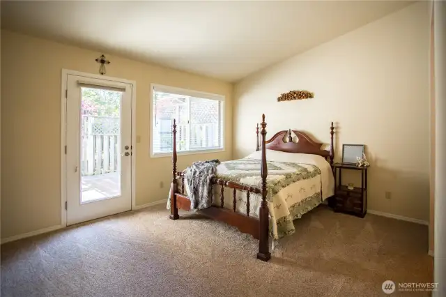 The primary suite includes access to the private, fenced patio.