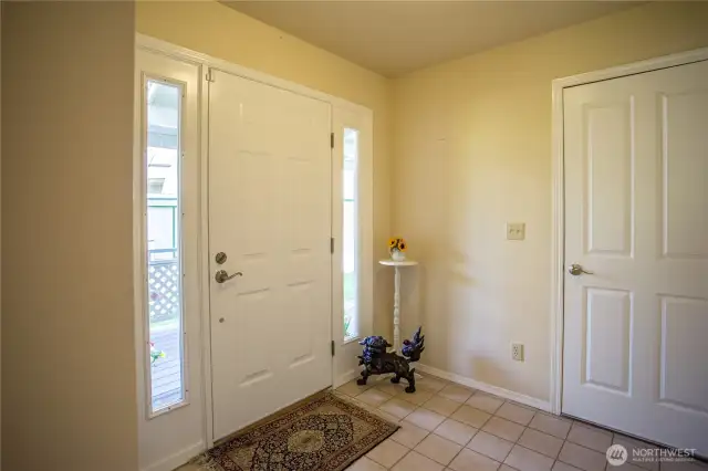 Front entrance includes a closet and two-car garage entry.