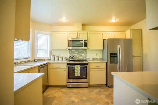 Kitchen provides plenty of practical space and storage for cooking your favorite meal.