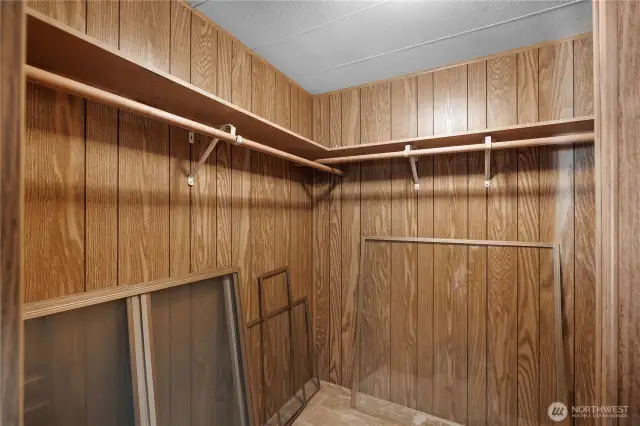Primary Walk in Closet w/ built ins