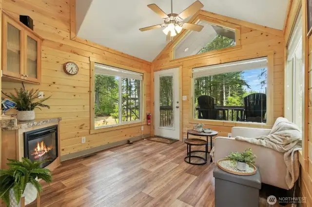 Vaulted ceiling in living room, fireplace, built ins and loft above!