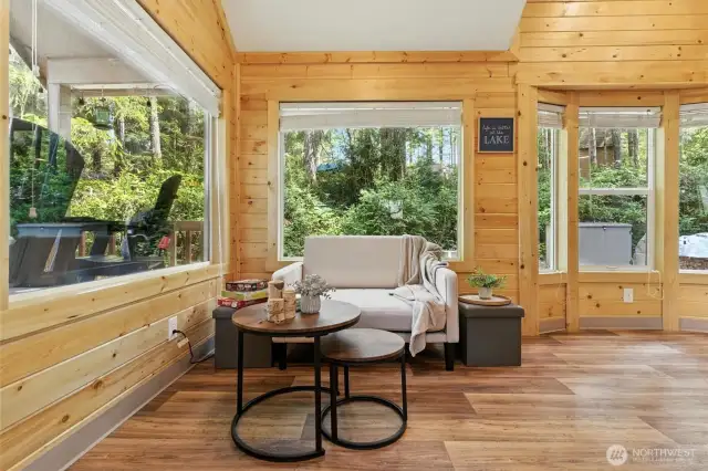 floors just showing off and those windows framing the greenery- swoon