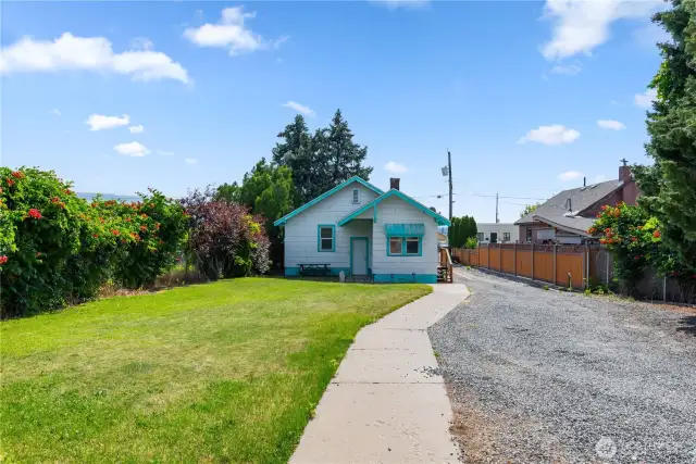 Back entrance with plenty of yard space and parking space