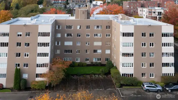 Reserved Parking at the end of the Cul de sac. Parking for this unit #406 is the middle space. This image faces West towards the direction of Queen Ann Avenue. A suprisingly peaceful location in a very desirable neighborhood.
