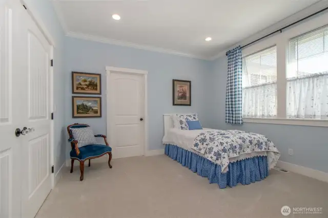 Guest bedroom with door to ADU