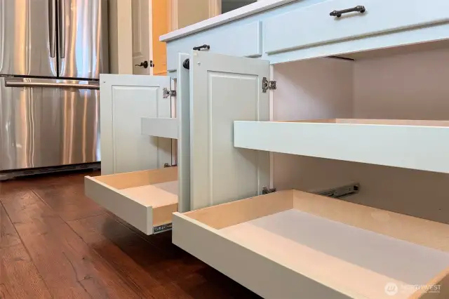 ADU has pull out drawers in the kitchen for ease of storing pots and pans