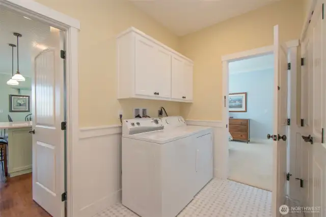 ADU laundry room connect to main home via guest bedroom