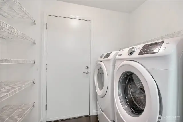 Walk-in laundry/pantry room. Side-by-Side washer/dryer conveys.