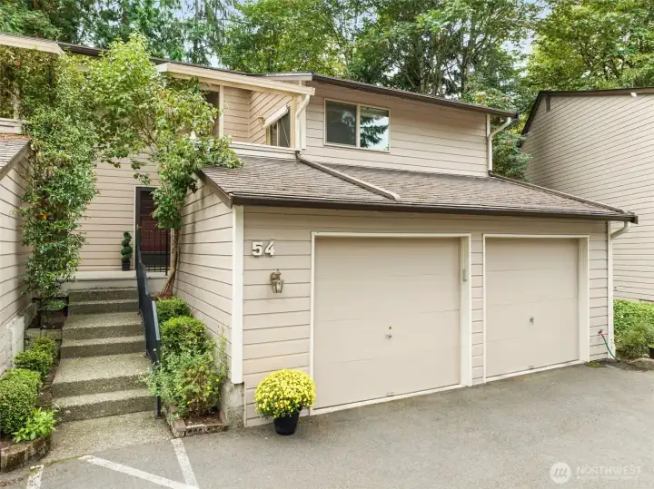End-unit townhome with 2-car garage and private entry. Nestled in the trees of Forestbrook, this home combines convenience with a warm and welcoming setting.
