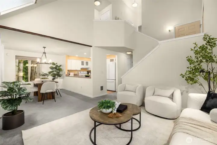 Bright and spacious layout with vaulted ceilings, open dining area, and connected kitchen — ideal for entertaining.