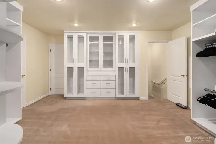 Bonus room with a complete closet organization system providing ample storage and seasonal wardrobe rotation.