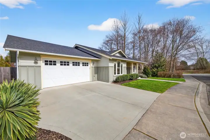 Ample parking in the driveway and oversized 2 car garage with space for storage/shop.