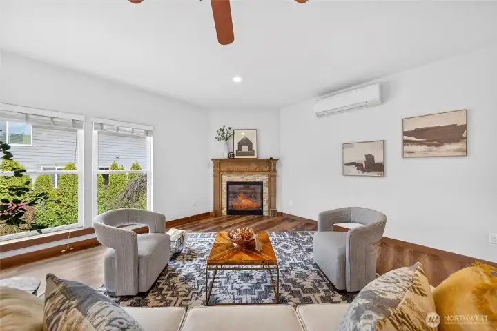 light and bright living spaces with large windows overlooking the backyard.