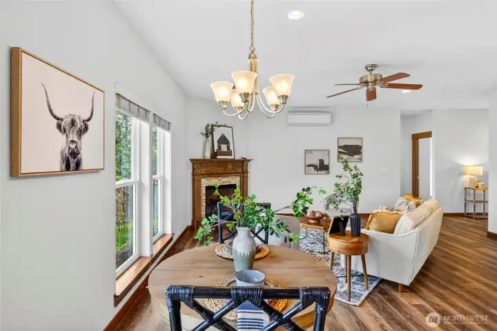 Dining space situated between the kitchen and dining has plenty of space for any size table.