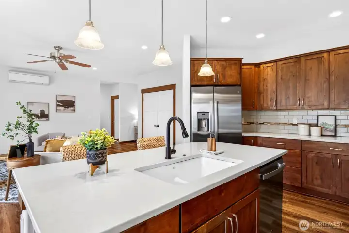 kitchen island with sink and storage.