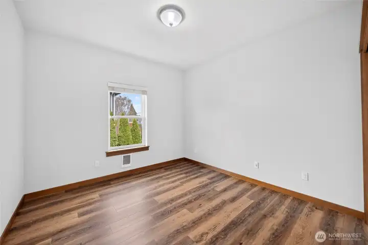 Second bedroom with new flooring.