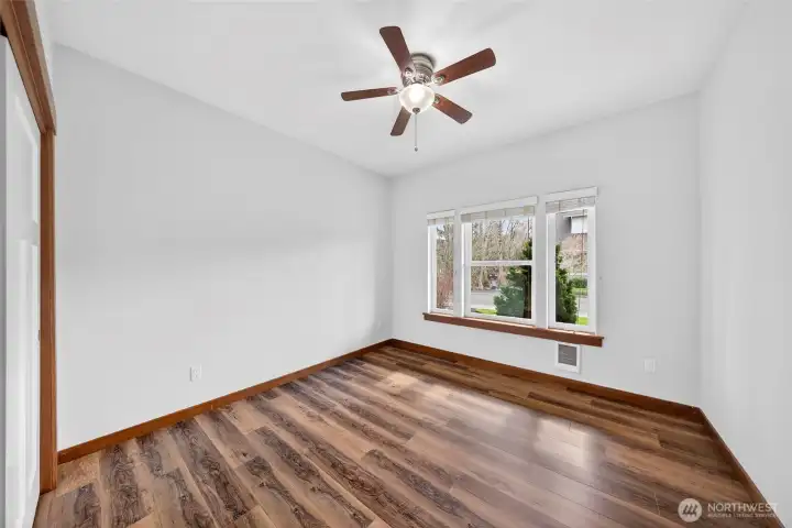 3rd bedroom with new flooring and full closet.