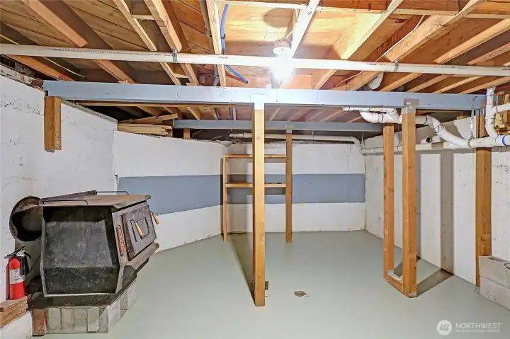 Full basement with original wood stove that still works!