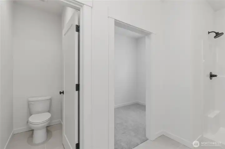 Primary bath with walk in closet Primary bath with walk in closet