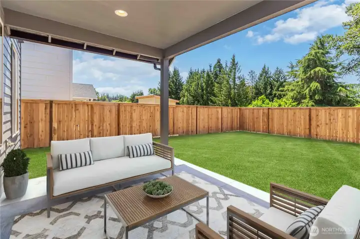 Back patio/ yard virtually staged Back patio/ yard virtually staged