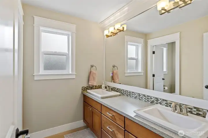 Dual vanities and full bath up stairs