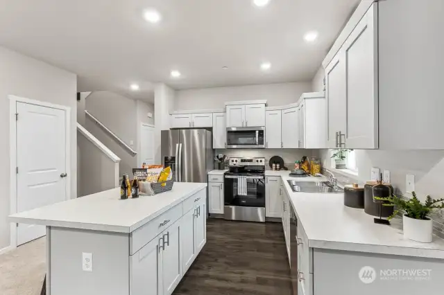 Kitchen with Loads of Cabinet Space. Photo of model home and not of same design.  Photos are for representational purposes only. Colors and options may vary.
