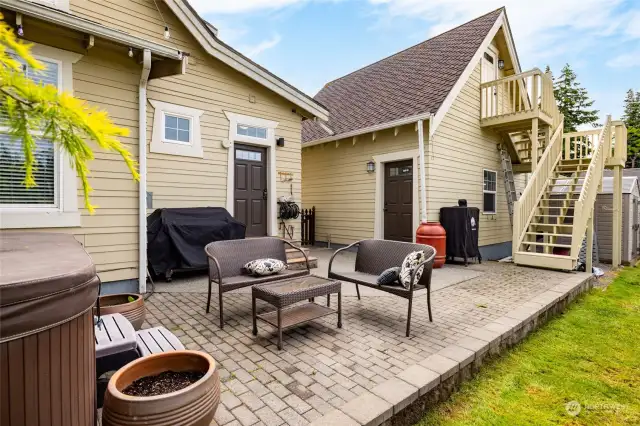 The patio area is ideal for summer barbecues and gatherings with friends and family. Mature landscaping adds to the beauty and privacy of the outdoor space. Additionally, this home has a finished storage area above the garage.