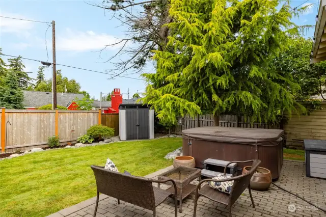 Step outside to your private oasis. The fully fenced yard is perfect for outdoor enthusiasts. Relax in the hot tub after a long day and enjoy the serene surroundings