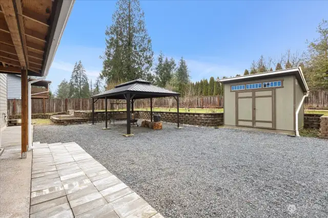 Spacious Back Yard with Tool Shed and Gazebo