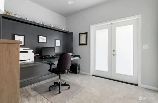 Guest bedroom two. Murphy bed folds up to become the perfect desk and workspace.