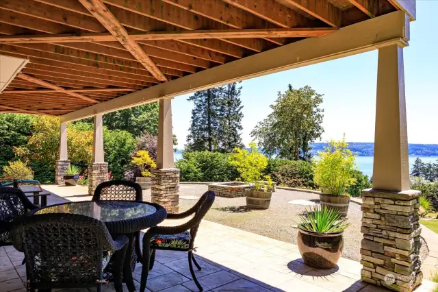 Lower level patio underneath deck accessed from bedroom number two.