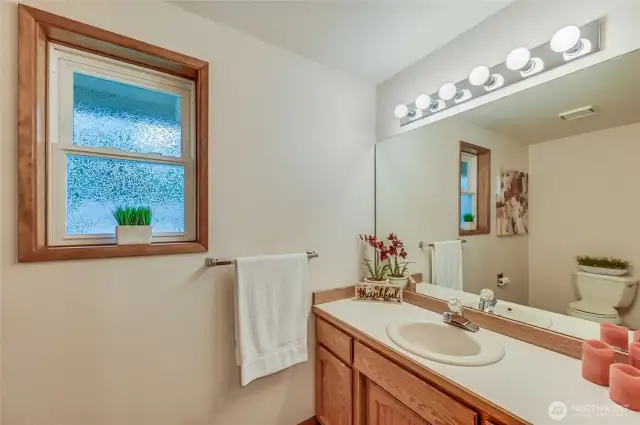 bath off of laundry & garage area