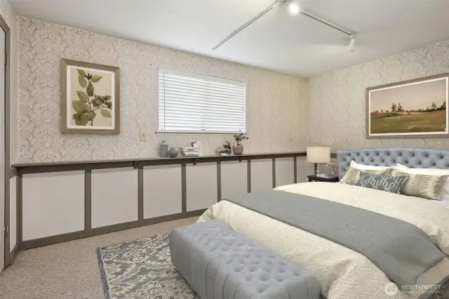 Lower level bedroom. (virtually staged)