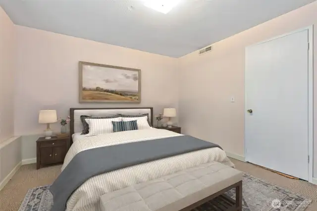 lower level bedroom. (virtually staged)