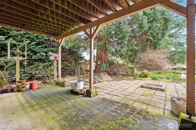 Lower level sliding glass doors lead to this patio area.
