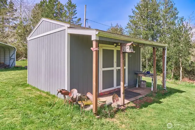 His/her/they shed in the back yard, large enough for tools and hobbies