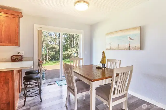 Dining area with slider to back deck