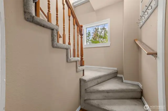Staircase from the kitchen to upper level