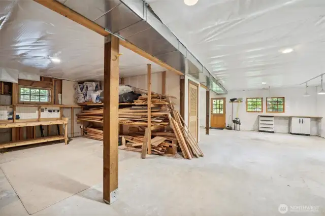 Daylight basement is insulated and ready for your plans!  It was used as storage by the sellers.