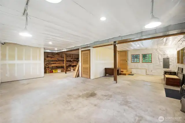 Daylight basement is insulated and ready for your plans!  It was used as storage by the sellers.