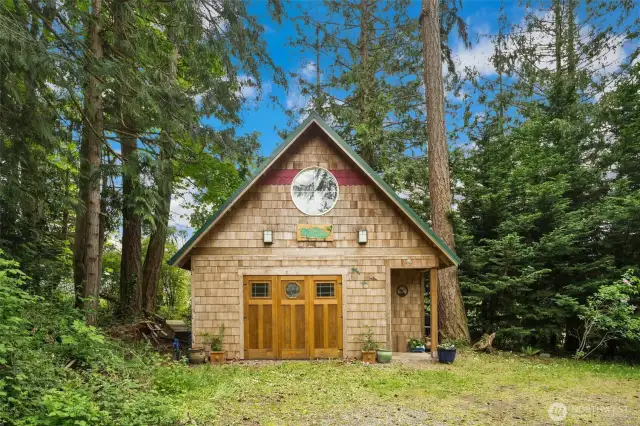 The detached shop/garage is beautifully detailed.