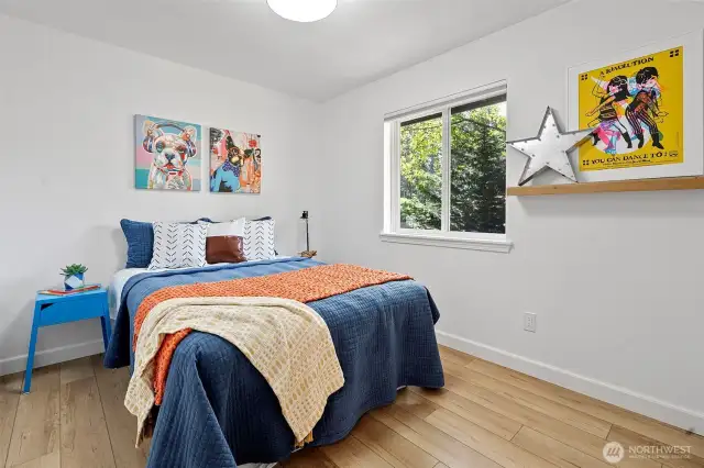 Secondary bedroom overlooks the backyard.