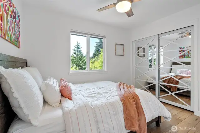 Additional secondary bedroom overlooks the backyard.