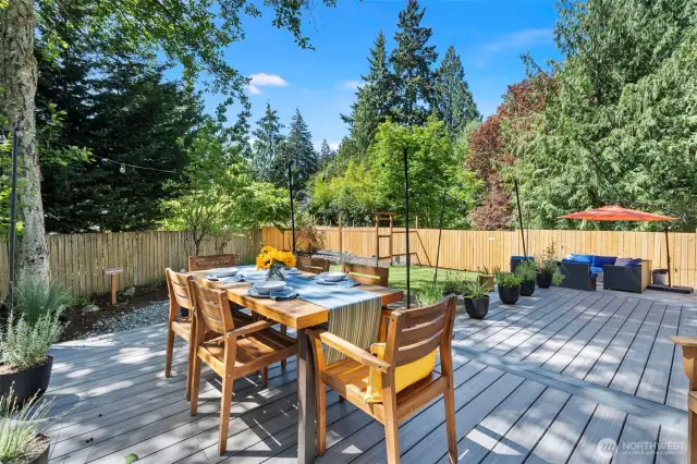 The deck provides a great view to a large and private backyard.