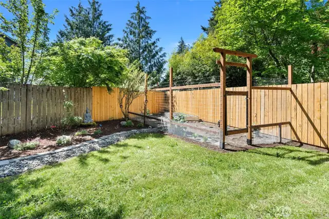 En enclosed vegetable garden keeps hungry critters away.