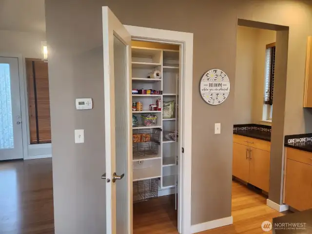 This pantry may look small, but the set up with shelving gives you plenty of room for your storage needs.