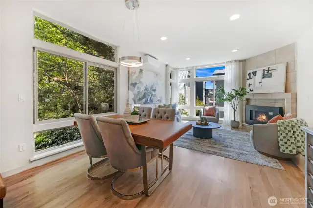 Fantastic oak hardwood flooring throughout the main level.  Note the mini-split for warming and cooling the room as needed.